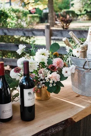 Flowers and wine at the reception
